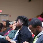 Everyone is intently listening