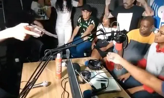 Brazilian radio host & guests getting robbed live on air
