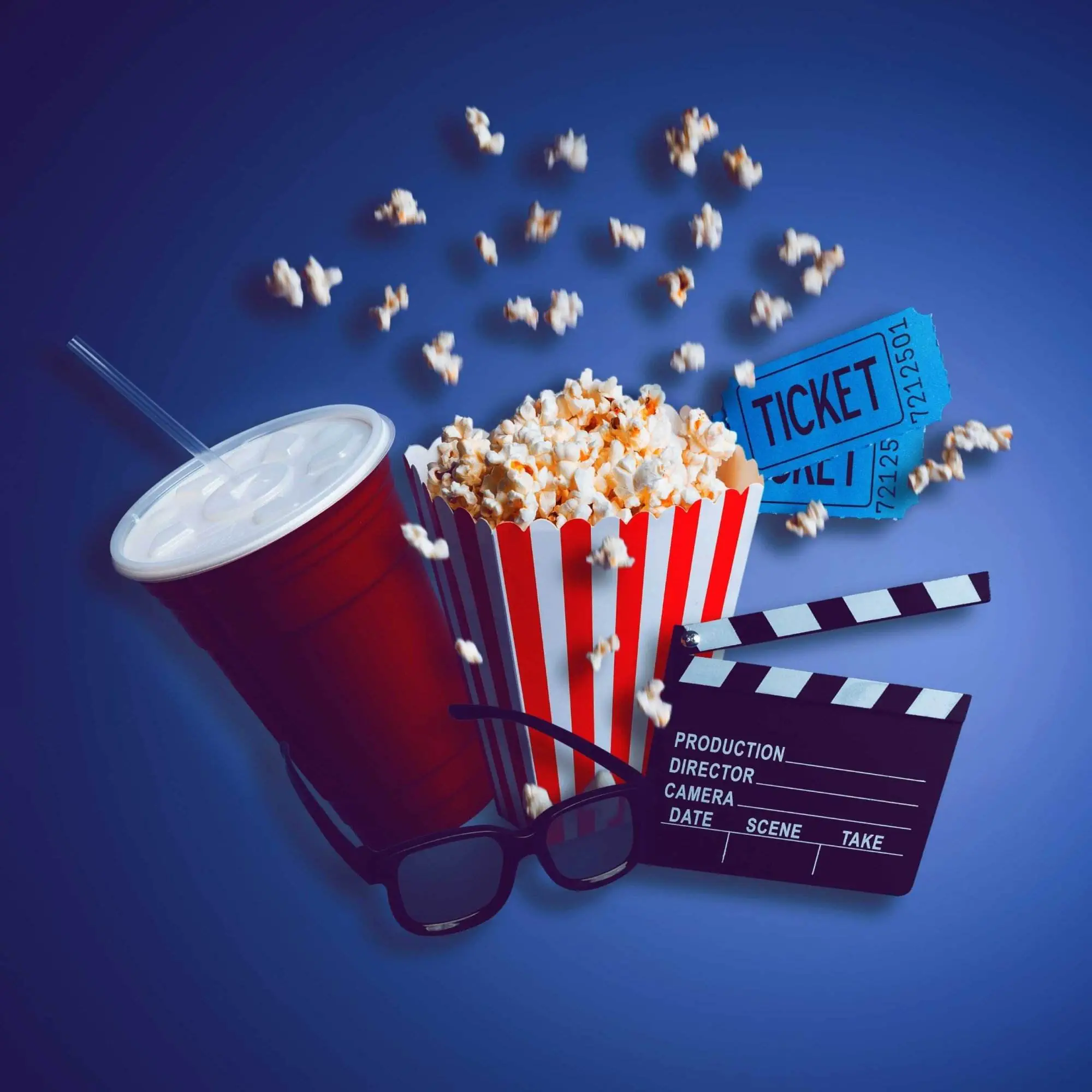 A carton of popcorn, a large soda, two blue movie tickets, a director's clapboard, and sunglasses on a blue background.