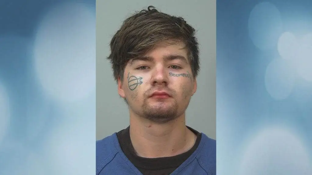 Mugshot of racist white wisconsin man, angel e. martell