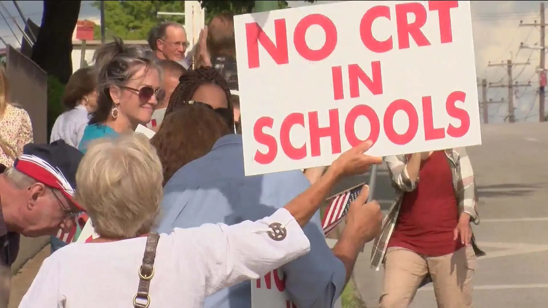 White people protesting critical race theory in schools